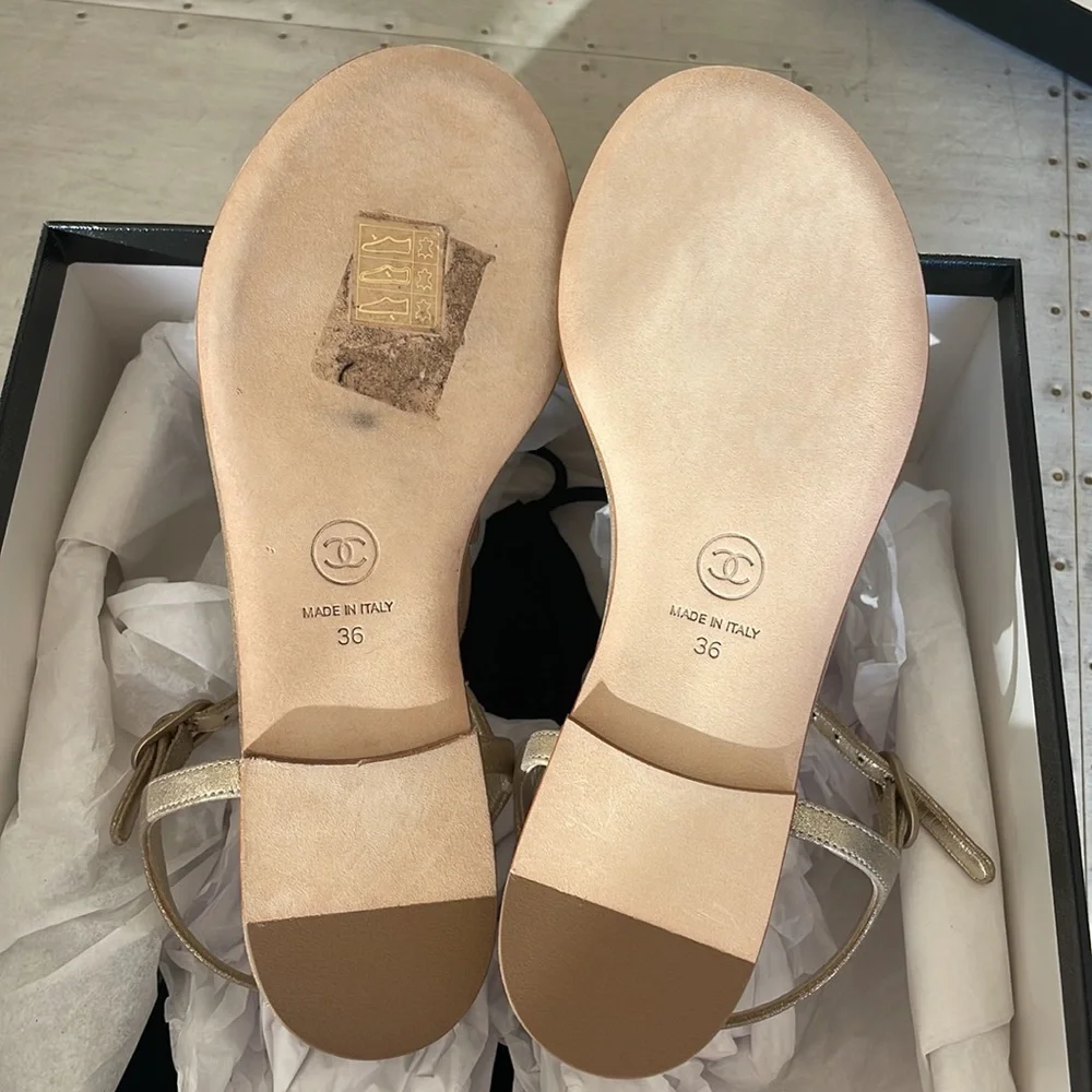 Chanel gold wing thong sandal goatskin metallic flats sz 36